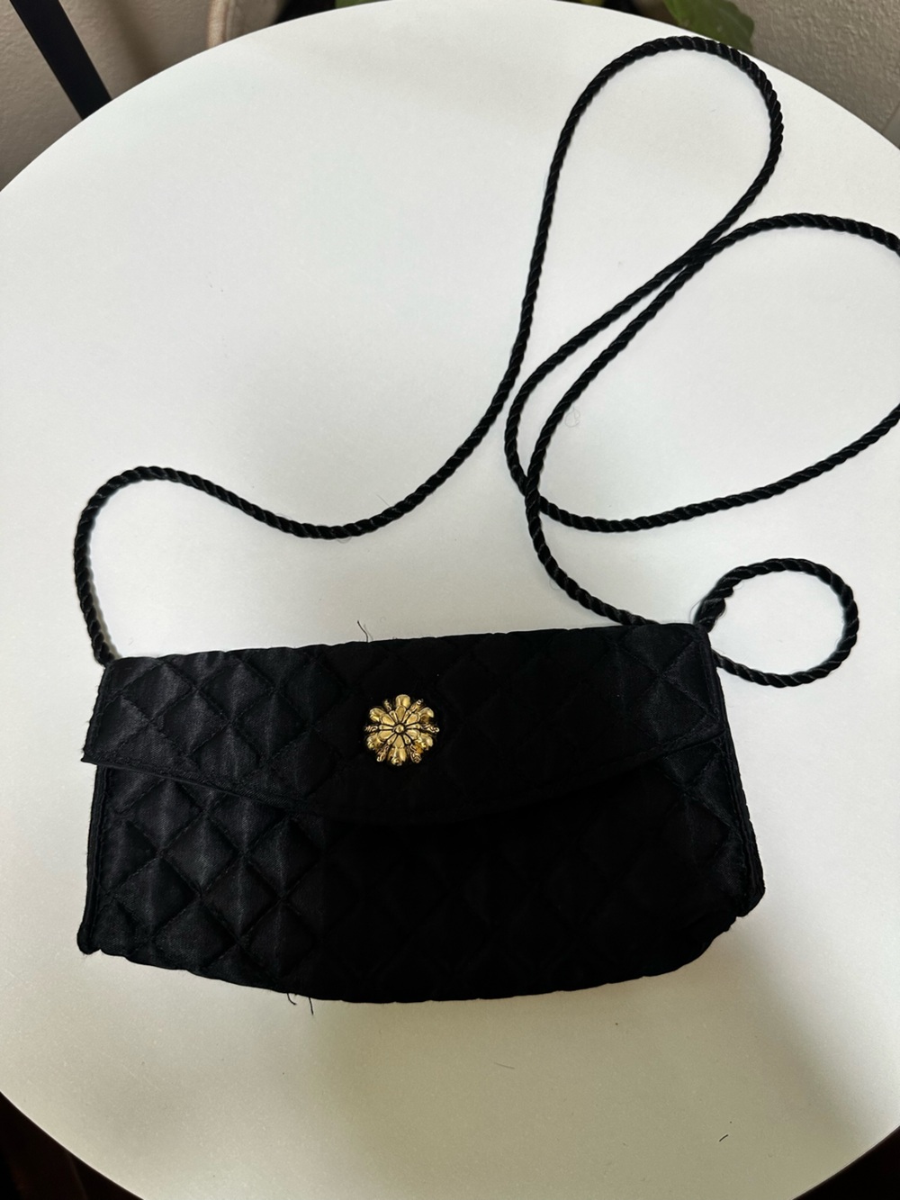 Lancome Black Quilted Crossbody Bag with Gold Floral Button